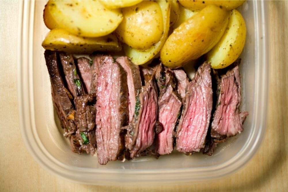 How should you store cooked steak