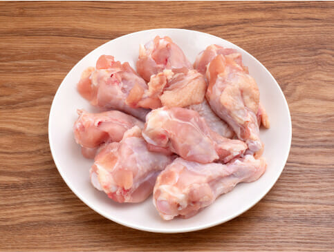 how long can raw chicken sit out
